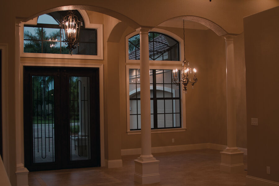 Foyer with columns and chandelier