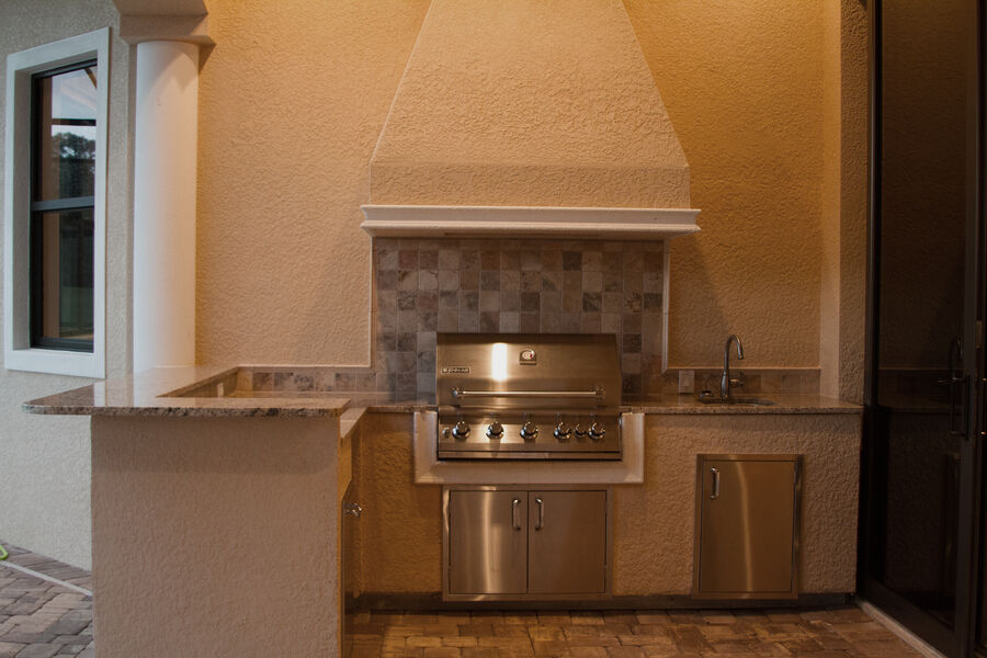 Custom outdoor kitchen with built-in grill