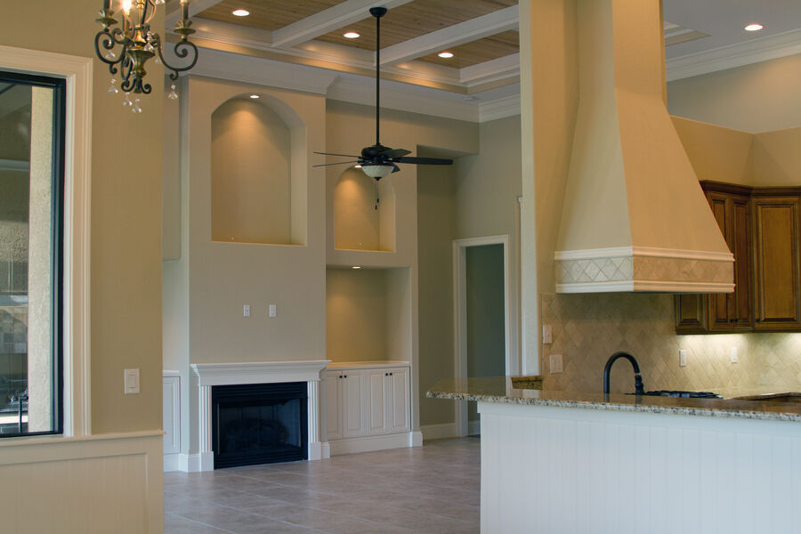 Great room with fireplace and coffered ceilings